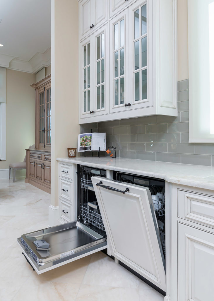 The dishwasher appliance panels give this Highpoint kithen a seamless look.